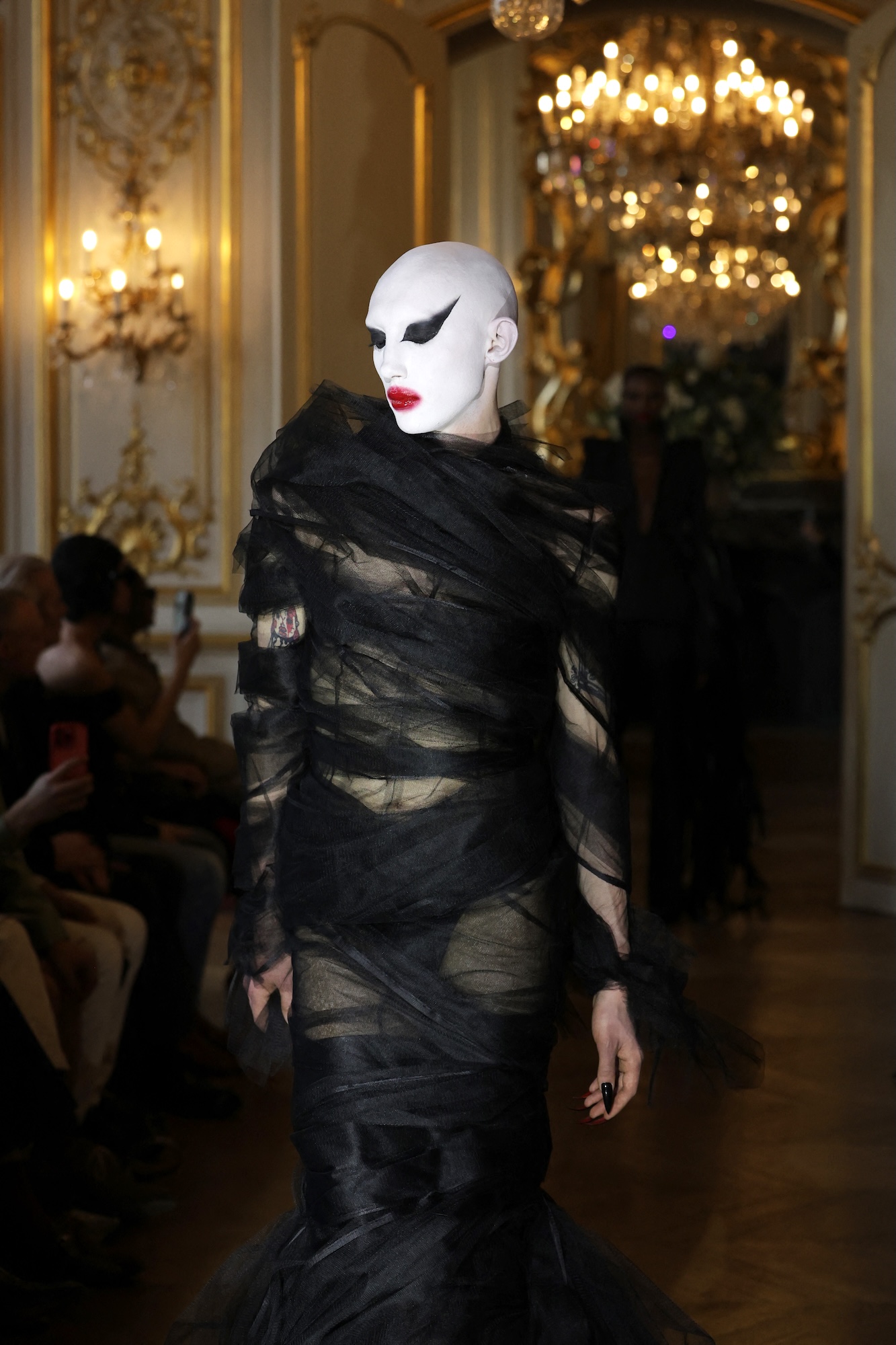 A model presents a creation by Matieres Fecales for the Womenswear Ready-to-wear Fall-Winter 2025/2026 collection as part of the Paris Fashion Week, in Paris on March 7, 2025. (Photo by Thibaud MORITZ / AFP)