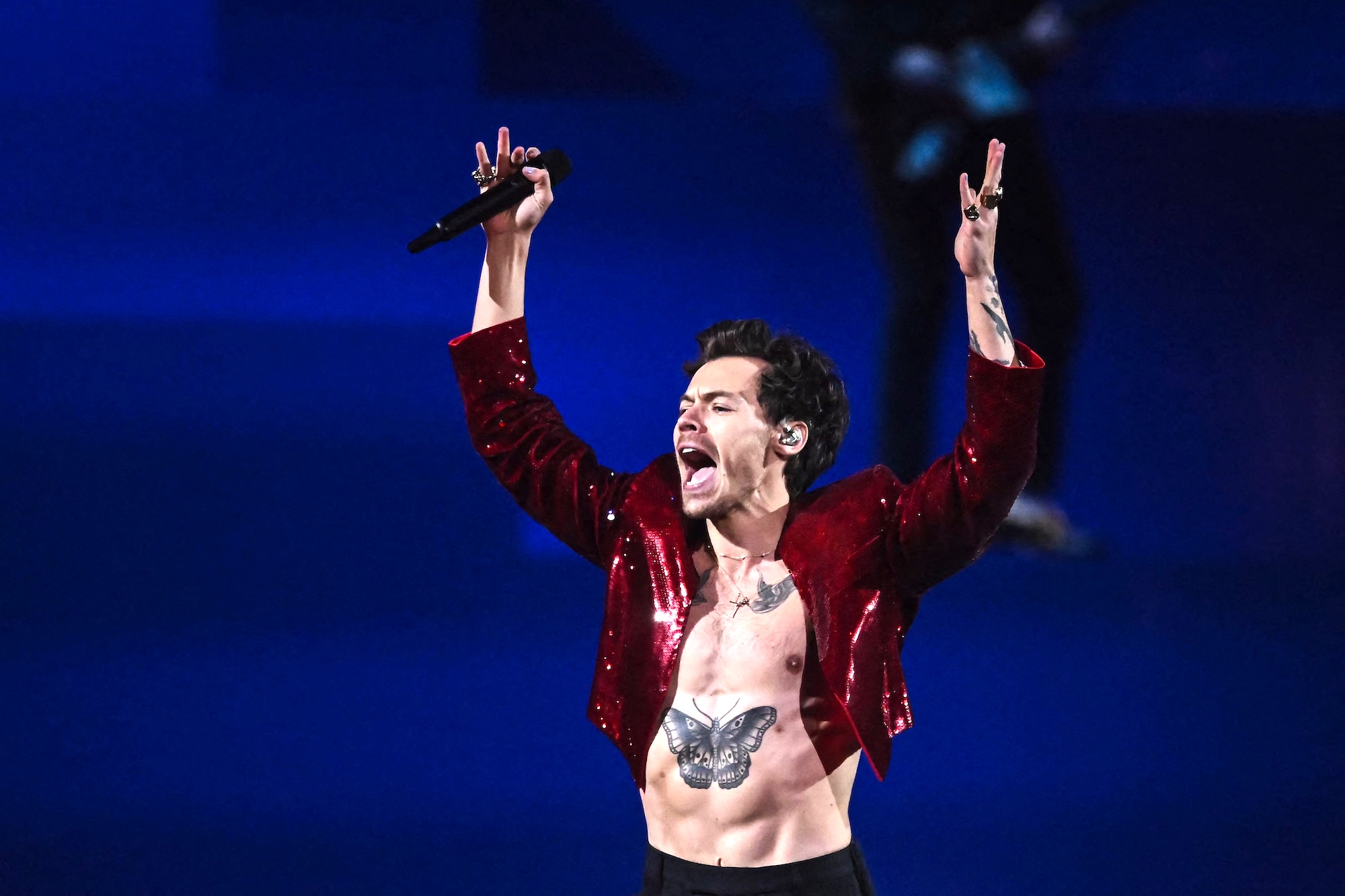 British singer Harry Styles performs on stage during BRIT Awards 2023 ceremony and live show in London on February 11, 2023. (Photo by Ben Stansall / AFP) / RESTRICTED TO EDITORIAL USE ñ NO POSTERS ñ NO MERCHANDISEñ NO USE IN PUBLICATIONS DEVOTED TO ARTISTS - RESTRICTED TO EDITORIAL USE ñ NO POSTERS ñ NO MERCHANDISEñ NO USE IN PUBLICATIONS DEVOTED TO ARTISTS