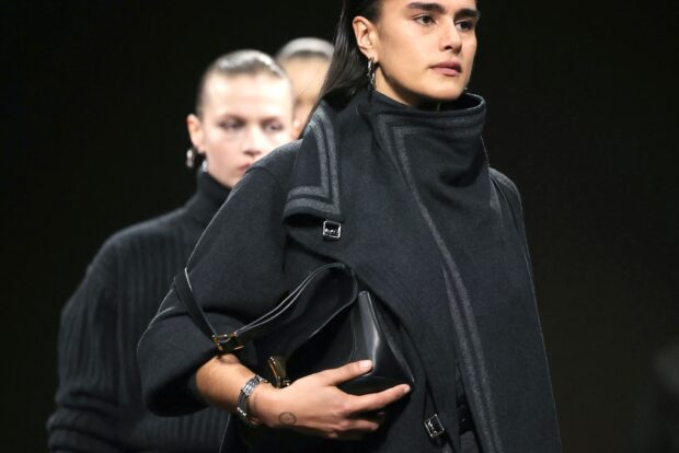 A model presents a creation by Hermes for the Womenswear Ready-to-wear Fall-Winter 2025/2026 collection as part of the Paris Fashion Week, in Paris on March 8, 2025. (Photo by Thomas SAMSON / AFP)