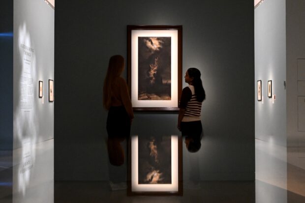A drawing by French author Victor Hugo, entitled "The Lighthouse at Casquets" is pictured during a photocall at the Royal Academy of Arts (RA) in London on March 18, 2025. The exhibition is set to run from March 21 to June 29, 2025. (Photo by JUSTIN TALLIS / AFP) / RESTRICTED TO EDITORIAL USE - MANDATORY MENTION OF THE ARTIST UPON PUBLICATION - TO ILLUSTRATE THE EVENT AS SPECIFIED IN THE CAPTION