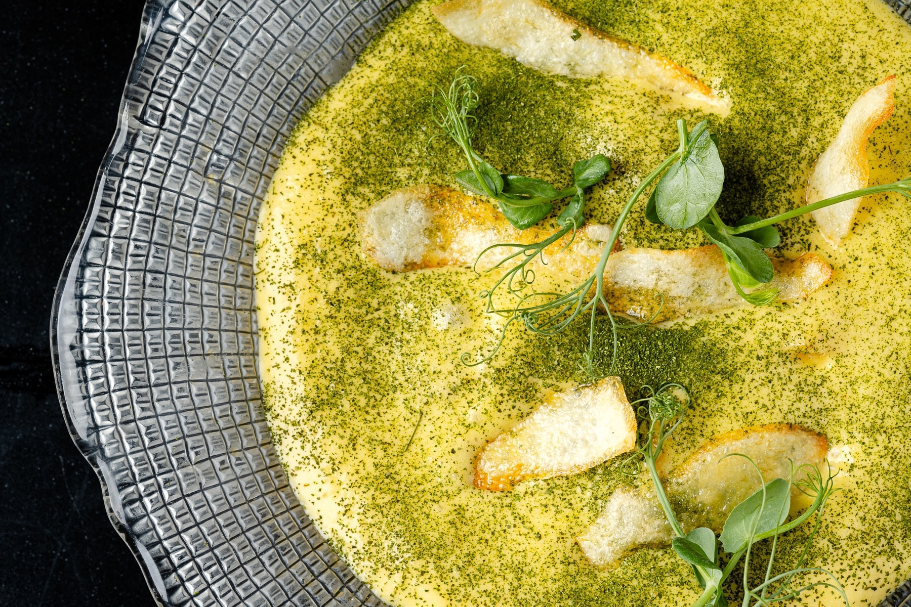 Baby squid ink stew with potato textures