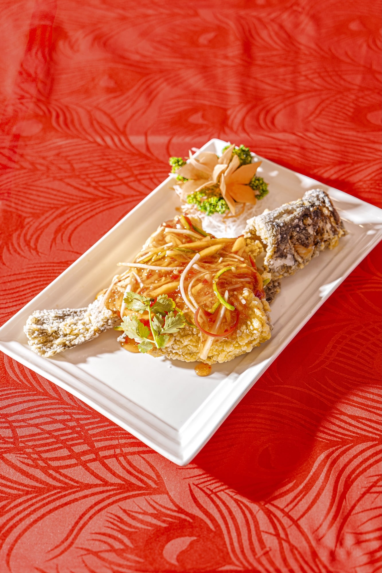 Whole deep-fried lapu-lapu with mango sauce