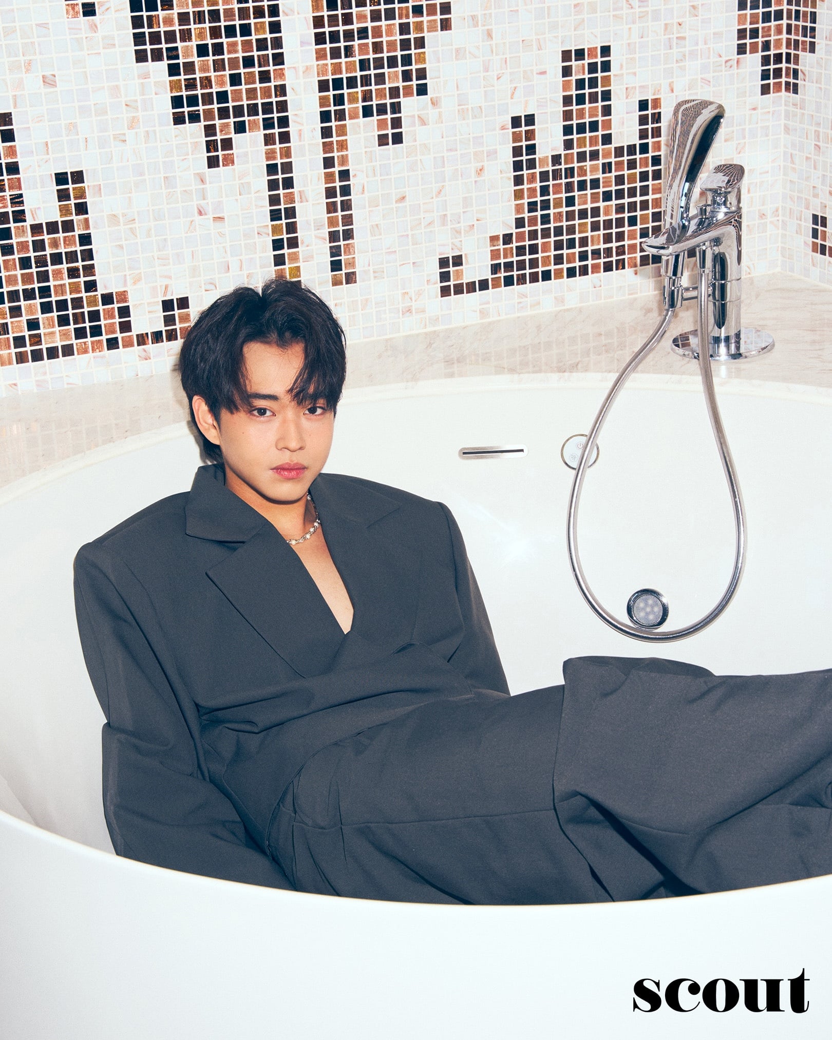 While Rabin Angeles casually sits in an empty bathtub of our shoot’s hotel room, I learned about how “sacrifice” is really embedded in his DNA
